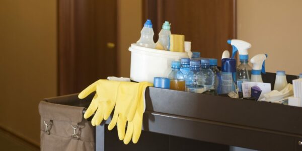 Cleaners Trolley With Equipment At Hotel