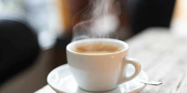 Refreshing hot cup of coffee at a cafe