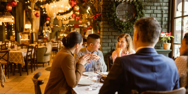 Business people having dinner in luxury restaurant