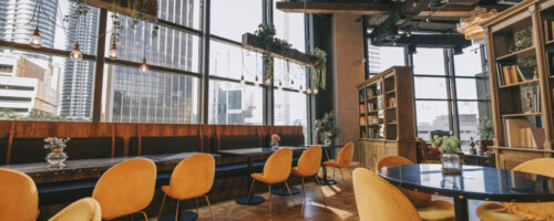 cozy restaurant interior design with yellow chair