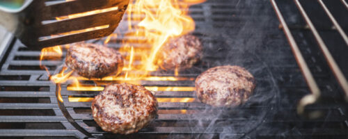 Hamburgers cooking on the BBQ Hamburgers cooking on the BBQ