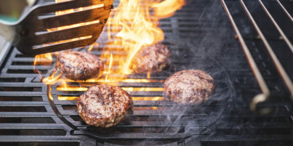 Hamburgers cooking on the BBQ Hamburgers cooking on the BBQ